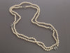 Chanel Extra Long Pearl Logo Necklace