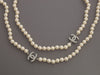 Chanel Extra Long Pearl Logo Necklace