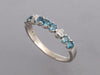 14K White Gold Blue Topaz and Diamond Tiny Skull Band