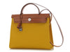Hermès’ Jaune de Naples Toile and Vache Hunter Herbag Zip 31