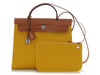 Hermès’ Jaune de Naples Toile and Vache Hunter Herbag Zip 31