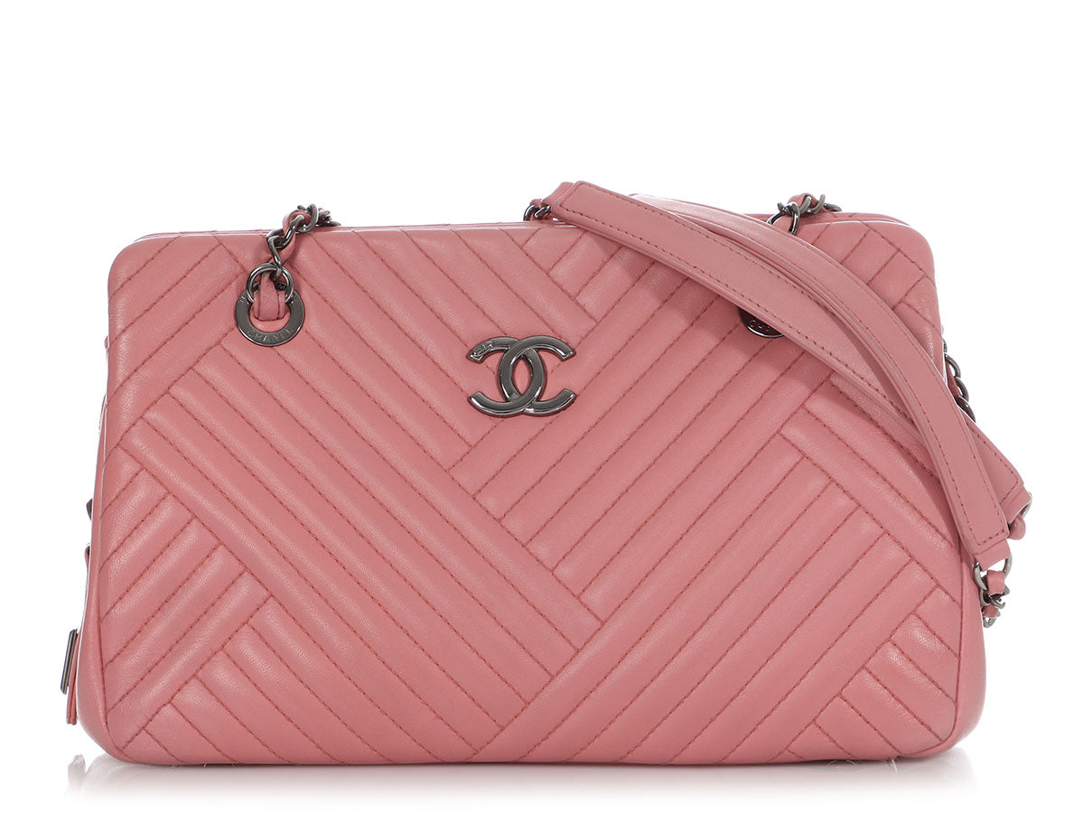 chanel pink and black handbag