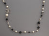 Chanel Long Black Beads, Pearls, and Crystal Logos Necklace