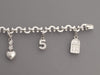 Chanel 18K White Gold Diamond Logo Charm Bracelet