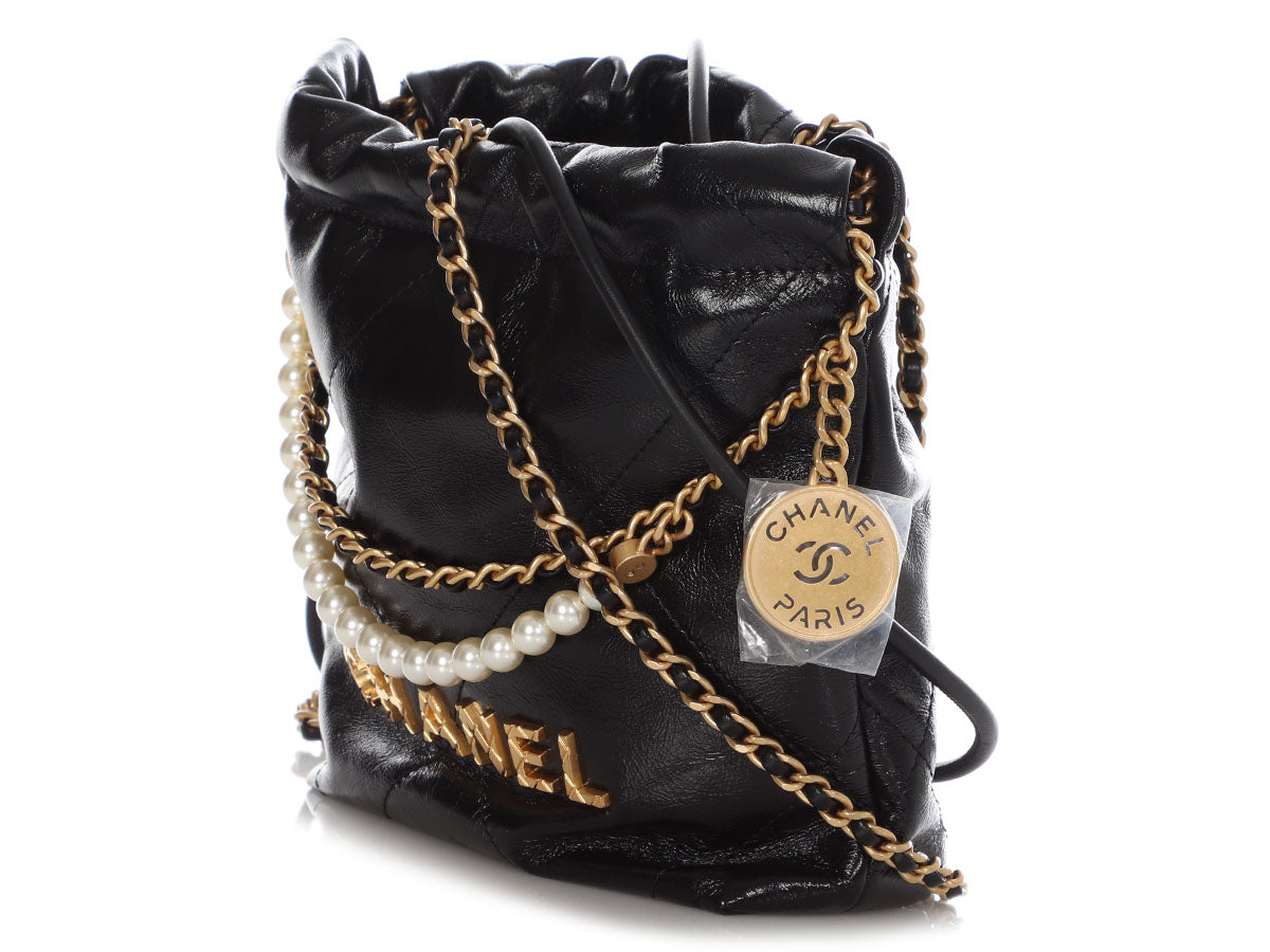 Chanel Drawstring Round Bucket Bag Pearl Embellished Quilted Lambskin