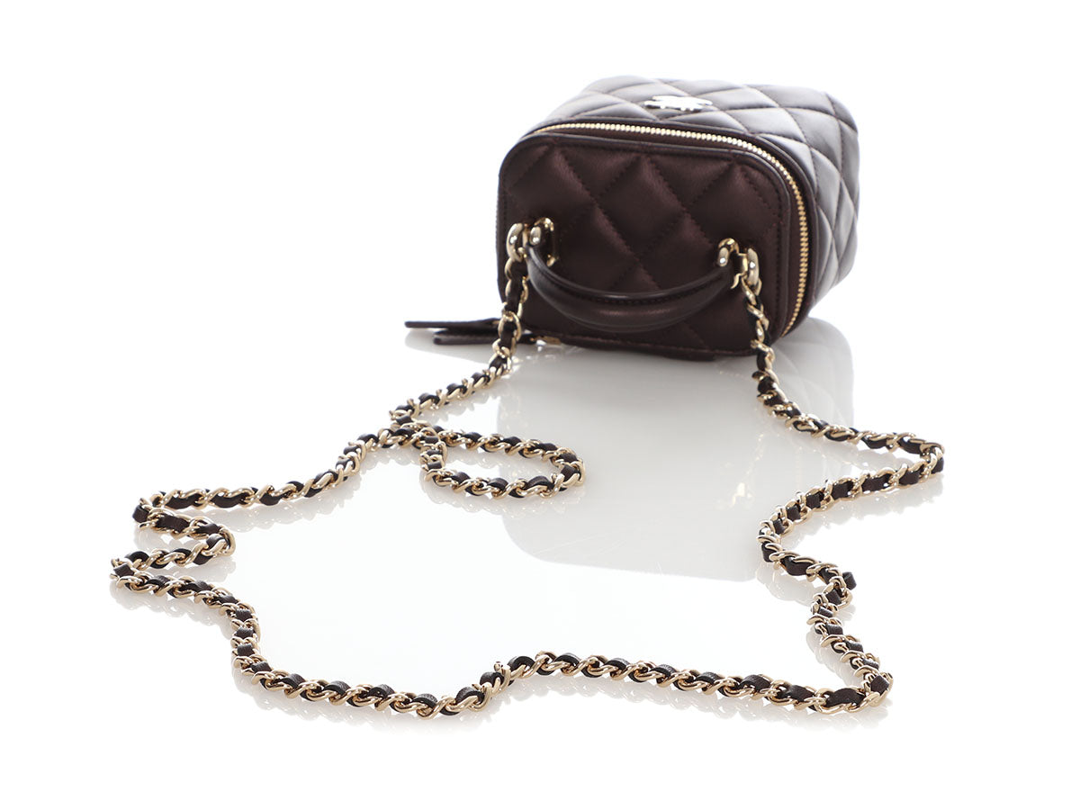 CHANEL Metallic Lambskin Quilted Round Mini Vanity Case With Chain