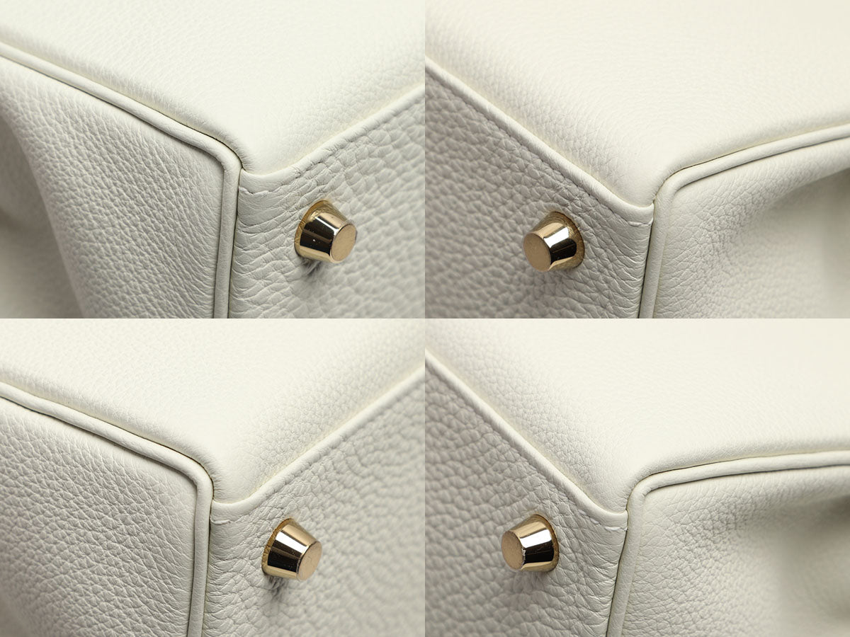 HERMÈS Kelly 25 handbag in Mushroom Togo leather with Gold