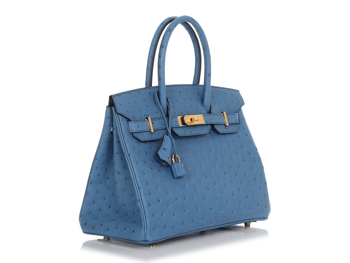 A DEEP BLUE OSTRICH LEATHER BIRKIN 25 WITH GOLD HARDWARE