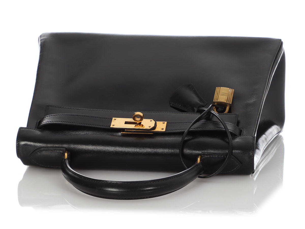 An Exceptional Hermès Kelly Cut SO-BLACK Calf Box Leather with Feather