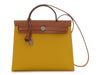 Hermès’ Jaune de Naples Toile and Vache Hunter Herbag Zip 31