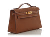 Hermès Gold Swift Kelly Pochette