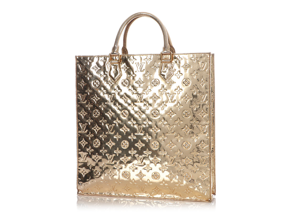 feature bag #25: Monogram Miroir Sac Plat