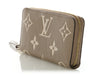 Louis Vuitton Dove and Cream Bicolor Monogram Empreinte Leather Zippy Wallet