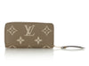 Louis Vuitton Dove and Cream Bicolor Monogram Empreinte Leather Zippy Wallet