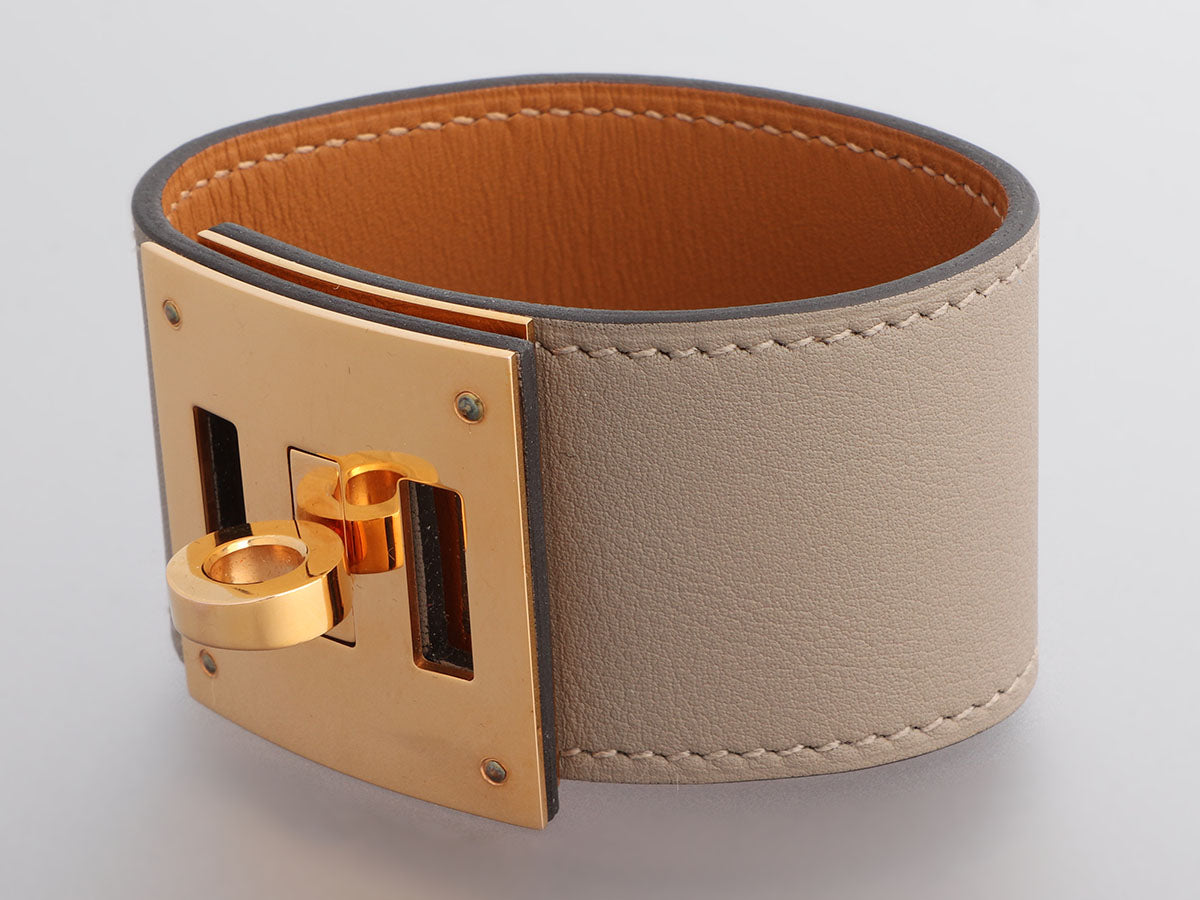 preowned Hermès Kelly Dog Extreme Cuff Etoupe Swift