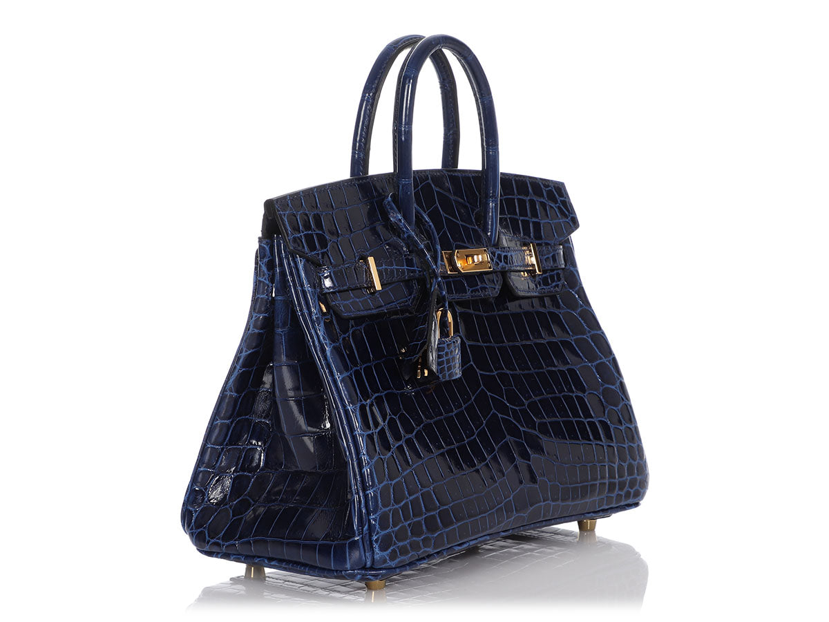 Bonhams : Hermès Blue Marine Shiny Crocodile Niloticus Birkin 25, c. 2010  (Includes padlock, keys, cloche, dust bags, rain jacket, box)