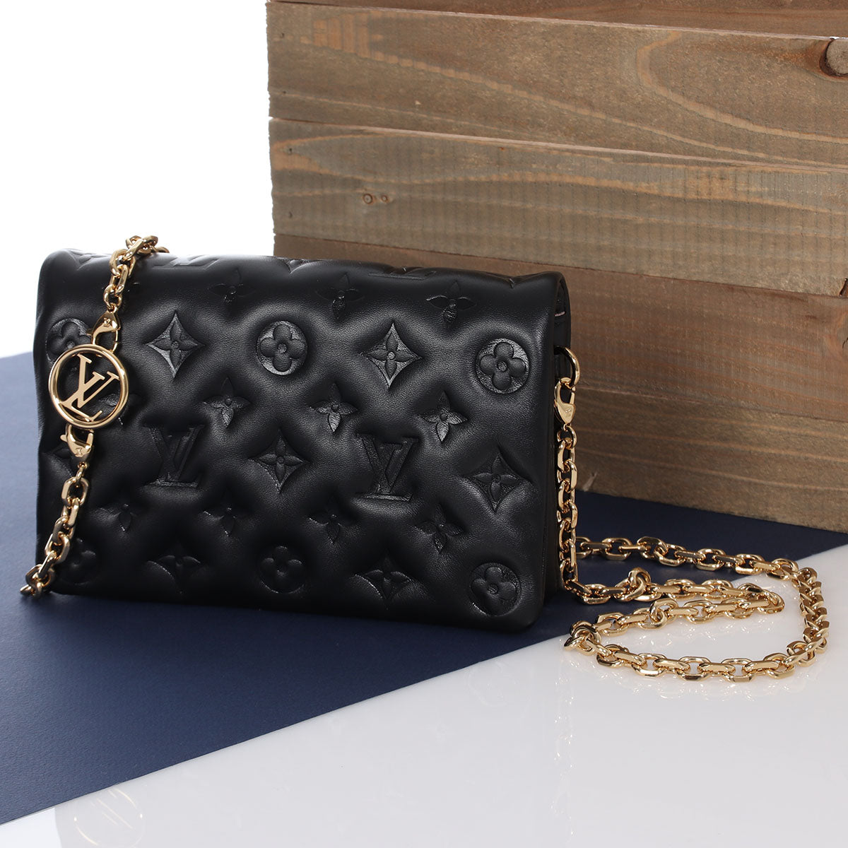 Louis Vuitton Leather Monogram Embossed Clutch Black